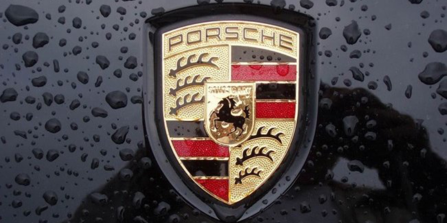 Các logo xe hơi nổi tiếng thế giới 9 Porsche – Huy hieu chien binh Duc 1931